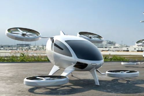 Futuristische Flugtaxis auf einem Landeplatz am Flughafen.